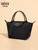 Bolsa de Nylon Minimalista Estilo Francês de Alta Qualidade, Bolsa Tote Dobrável Leve para Viagem, Bolsa de Ombro Versátil para o Dia a Dia para Mulheres