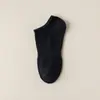 Calcetines de hombre desodorantes absorbentes de sudor primavera y otoño cuatro estaciones calcetines de algodón calcetines deportivos para mujer al por mayor