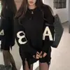 Suéter Negro de Punto Holgado y Relajado Estilo Coreano para Mujer 2026 Otoño e Invierno Suéter de Manga Larga de Longitud Media para Mujer para Usar como Exterior