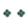 Moda de Nicho Simple Circonita Trébol de Cuatro Hojas Pendientes Pequeños Exquisitos Para el Uso Diario Pequeños Versátiles Pendientes Súper Brillantes Venta al por Mayor