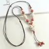 Collar de Cerámica Estilo Étnico Retro Joyería Diseño de Nicho Colgante de Corazón Cadena Larga para Suéter Simple Versátil Mayoreo