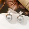 Pendientes de Perlas con Corona de Lujo Ligero de Gama Alta Aguja de Plata de Ley 925 Pendientes de Nicho de Gama Alta Pendientes Únicos Elegantes