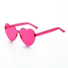 Nuevas gafas de sol transparentes color gelatina corazón de melocotón moda europea y americana sin montura de una sola pieza gafas de sol Oceánicas gafas con forma de corazón