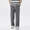 Calça casual masculina de seda gelada preta, elástica, secagem rápida, sensação refrescante, modelo novo de verão 2026, cintura elástica, calça reta folgada