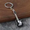 Novo chaveiro pingente de guitarra transfronteiriço, pingente criativo de instrumento musical, liga de zinco DIY decoração para mochila de estudante