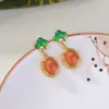 Pendientes Yilu de Plata de Ley S925 Chapados en Oro Ágata Roja del Sur Ámbar Nuevo Estilo Chino Ruyi Temperamento Versátiles Pendientes de Superficie de Huevo