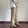 Pantalones de seda de hielo de secado rápido para hombre, nuevos pantalones deportivos de verano estilo americano de tres barras, pantalones casuales holgados, finos y de pierna ancha.