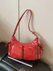 Bolso de axila de nicho coreano para mujer 2024 Nuevo Vintage Simple de alta gama Bolso cruzado Dulce Fresco Bolso de motociclista