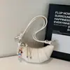 Bolsa de Dumpling da Moda Feminina 2026 Primavera Nova Moda Bolsa de Ombro Simples Estilo Coreano Design de Nicho Bolsa Feminina