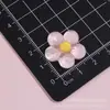 Accesorios de resina de flor redonda de cinco pétalos de color transparente como el hielo pegamento cremoso llavero DIY funda de teléfono hecha a mano accesorios para el cabello venta al por mayor