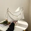 A bolsa popular sob o braço deste ano para mulheres 2026 Nova tendência transfronteiriça de luxo leve nicho para o dia a dia bolsa de ombro único transversal com corrente