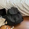Mochila casual artística de lona estilo japonés, mochila escolar plisada con cordón de moda, mochila popular de nailon de gran capacidad