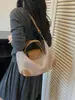Bolso de mano de paja versátil de moda transfronterizo para mujer, nuevo bolso de hombro cruzado de gran capacidad informal para el verano de 2026