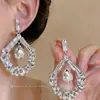 Pendientes de plata con forma de gota tachonados de diamantes, pendientes exagerados de moda de alta gama de nicho, pendientes de mujer de lujo ligero, únicos y elegantes
