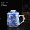 Juego de tres tazas de porcelana blanca, taza de oficina para beber té, separación de té y agua con tapa, juego de regalo para preparar té