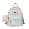 Mochila Transfronteriza Linda y Divertida Nuevo Estilo 2026 Bloques de Color Cuadros Frescos Bordado Gato de Dibujos Animados Mochila Multiusos