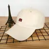 Estilo simple gorra de béisbol de primavera para mujer con letra M bordada estilo ins gorra de sol con visera curva para hombre gorra de pico estilo coreano