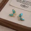Nuevos Pendientes Populares Franceses Retro de Mariposa Turquesa con Circonita Lujo Accesible Diseño de Nicho Pendientes de Gama Alta para Mujer