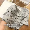 Pijama de estampado completo para mujer para primavera, verano y otoño, con mangas largas, cárdigan de punto acanalado de seda helada, ropa de estar holgada y un conjunto de dibujos animados moderno