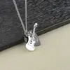Collar Transfronterizo para Hombre Europeo y Americano Púa de Guitarra de Rock Acero Inoxidable Colgante Hip-Hop Callejero Acero de Titanio Joyería de Moda