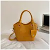Bolso de color sólido de alta calidad con textura tejida, nuevo estilo 2026, bolso cubo moderno, bolso cruzado elegante y a la moda, bolso de mano simple