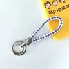 Chaveiro de corda trançada com anel duplo chaveiro de couro PU colorido novo pingente para bolsa feminina chaveiro para pendurar na cintura