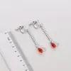 Cazador de Merchandising Popular de Anime Transfronterizo HxH Pendientes Personalizados para Mujer, Estilo Europeo y Americano Colgante de Cristal Rojo, Accesorios de Oreja Sencillos de Nicho