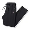 Pantalones deportivos de invierno para niños y adolescentes, pantalones de chándal de color sólido, con forro polar engrosado, para estudiantes de secundaria, casuales, combinables con todo, pantalones de moda para otoño e invierno
