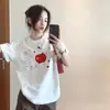 Camiseta Branca de Algodão Puro com Manga Curta para Mulheres 2026 Novo Verão Estilo Americano Design Solto Maçã Top de Nicho