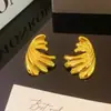 Explotaciones Transfronterizas Europeas y Americanas Moda Pendientes Sencillos Nuevo Sentido de Alta Gama Pendientes de Flor de Metal Pendientes de Estilo de Corte Retro