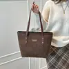 Bolsa de mano de alta gama al por mayor para mujer 2025 Invierno Nuevo Gran Capacidad Color Contrastante Bolso de Hombro Versátil Bolso de Axila