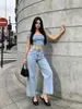 Jeans vintage europeo y americano azul claro con efecto lavado de copo de nieve, tiro alto, sin elasticidad, corte recto holgado, pantalones cropped que cubren la cadera, directo de fábrica