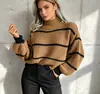 Suéter cruzado para mujer estilo europeo y americano con cuello medio alto, nuevo estilo otoño e invierno 2026, holgado y casual, top básico de punto talla grande
