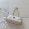 Bolsa vintage de luxo leve de nicho com padrão de diamante para mulheres, novo modelo 2026, bolsa tipo balde de alta qualidade, bolsa de mão para o trabalho, moderna e versátil