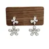 Nuevos Exquisitos Pendientes de Flor Blanca Incrustados de Diamantes, Elegantes y Sencillos, Pendientes de Clip Versátiles para Mujeres Sin Perforaciones