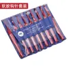 Venta al por mayor del fabricante Juego de ganchillos de mango suave rojo Herramientas de tejer hechas a mano para bricolaje para principiantes Suéter de ganchillo Gancho de ganchillo antideslizante