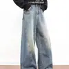 Jeans de diseño único con silueta para hombre, dobladillo curvo, mezclilla americana vintage desgastada, corte holgado, adelgazante, pantalones casuales de pierna ancha
