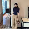 Camisa blanca de cuello medio y manga corta para mujer, top fino de modal de manga tres cuartos irregular para mujer