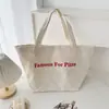 Bolsa de Lona Colorida com Letras para o Dia a Dia de Mulheres 2026 Nova Bolsa de Ombro Casual para o Dia a Dia Bolsa Tote Grande Capacidade para Estudantes