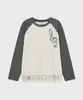 Ropa de verano nueva para mujer estilo INS transfronteriza con estampados de notas musicales y letras, top liso de moda ajustado, camiseta con capucha