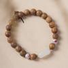 Pulsera DIY de magnolia de sándalo verde joyería fábrica venta al por mayor especificación 0.8 hombres y mujeres estilo simple decoración de rosario