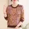 Otoño 2026 Nuevo Estilo Estampado Retro Cuello Redondo Tejido para Madres de Mediana Edad y Mayores Estilo Holgado que Cubre el Vientre Adelgazante Elegante Estilo que Reduce la Edad