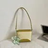 Bolsa de Praia para Férias de Verão para Mulheres 2026 Novo Estilo Bolsa de Ombro Tecida à Mão Bolsa Transversal de Palha para o Dia a Dia Bolsa Balde