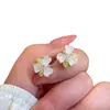 Brincos de flor de zircônia para mulheres, luxo leve, modernos, frescos, versáteis, novo modelo popular de 2026, de alta qualidade, requintados brincos de verão