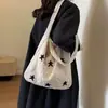 La bolsa tejida súper popular del verano para mujer, nuevo modelo 2026, estilo artístico, bolsa de playa tejida para vacaciones, bolso de hombro y cruzado