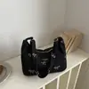 Bolso de hombro de alta gama, nuevo y elegante bolso de lona de mezclilla para mujer, bolso tote dulce y versátil con lazo, estilo casual