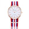 Fabricante de relógios estilo britânico de Genebra em estoque relógio de estudante simples de dois pinos pulseira de nylon ultrafina relógio de quartzo atacado