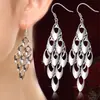 Dz Pendientes de gancho con borla estilo europeo y americano, cola de pavo real, para mujer, aretes exagerados de personalidad de nicho calados, aretes de lujo ligero de alta gama de moda