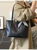 Bolso tote de gran capacidad para commuting para comercio exterior, nuevo bolso de hombro vintage 2026, versátil, simple, bolso de hombro y bandolera de alta gama