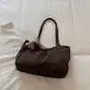 Bolso tote minimalista de estilo coreano con estampado de leopardo, nuevo para 2026, un bolso de hombro elegante y espacioso para el trabajo y los desplazamientos, también adecuado como bolso de axila